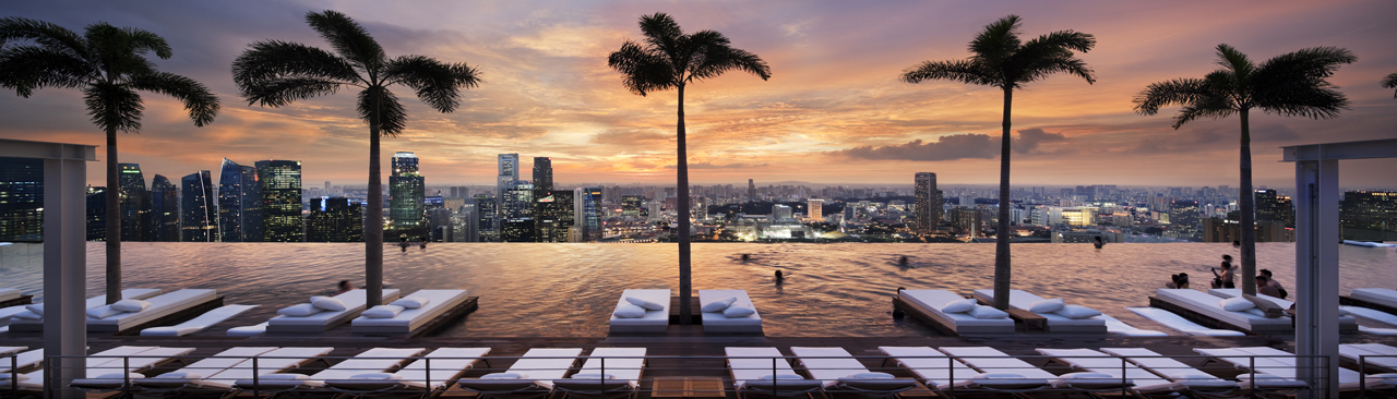 Marina Bay Sands SkyPark's rooftop pool at sunset
