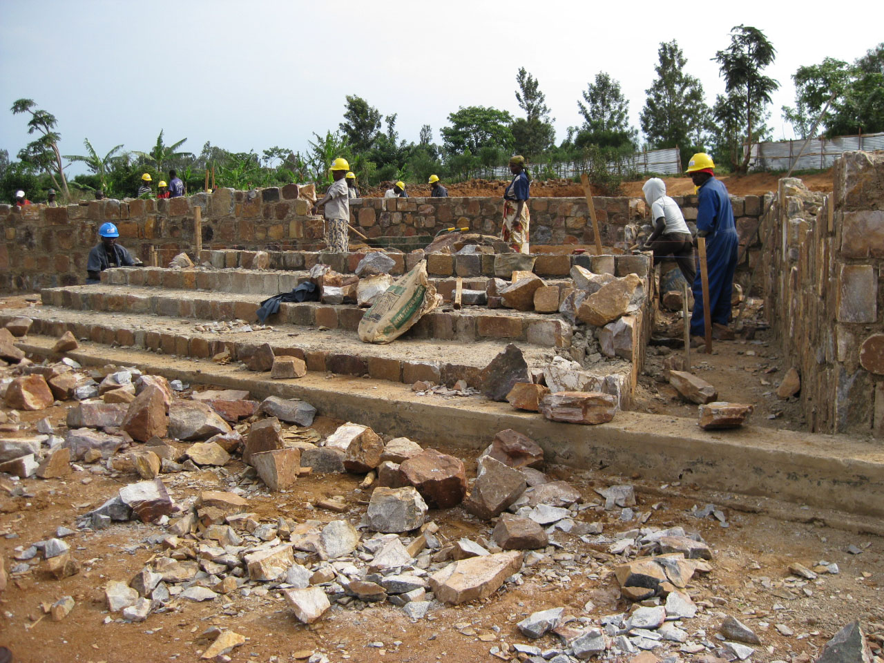 construction of a rock wall at the Gashora Girls Academy